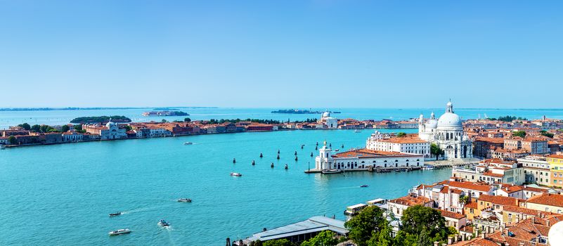 Beautiful view of the Grand Canal and Basilica Santa Maria della Salute in the late evening with very interesting clouds, Venice, Italy 