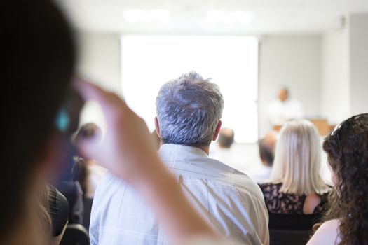 Business workshop and presentation. Audience at the conference room.