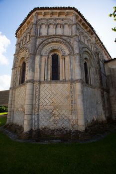 General abse view of the romanesque Rioux church. Region of Charente in France