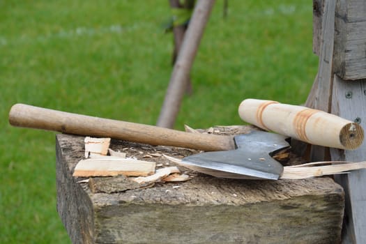 Carpenters Axe on chopping block