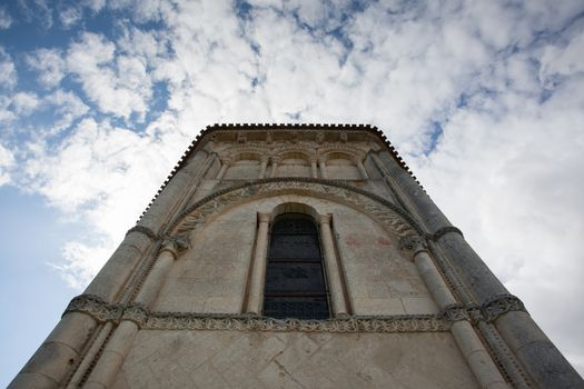 Abse view of the romanesque Retaud church,Charente, France