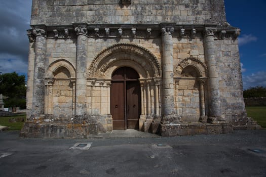 facade main entrance of the romanesque Retaud church,Charente, France