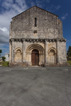 Full facade view of  the romanesque Retaud church,Charente, France