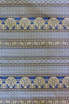 Closeup pattern of elephant and tree on thai silk fabric