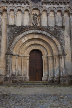 Facade detail of the romanesque Rioux church,Charente, France