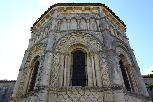Abse window of the romanesque Rioux church. Region of Charente in France