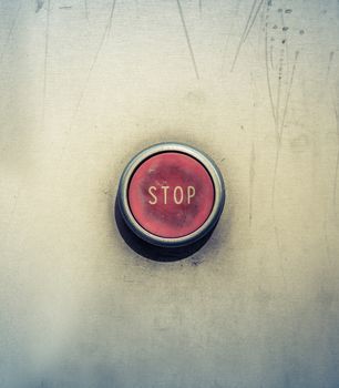 Retro Filtered Concept Photo Of A Red Emergency Stop Button