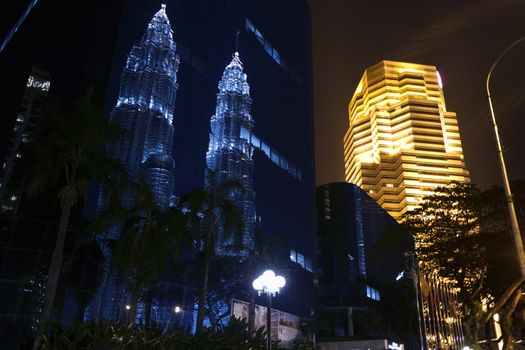 Kuala Lumpur Reflections. Building near Petronas Twin Towers. EDITORIAL with Trade marks,
Kuala Lumpur, Malaysia, June 17 2014.