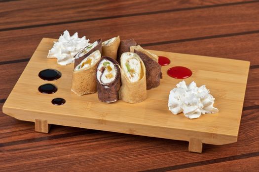 pancake roll with marmalade - dessert dish