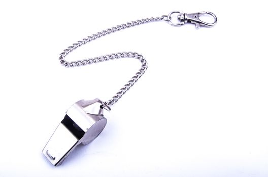 the beautiful world cup whistle with stainless steal ornamental chain
on the white background