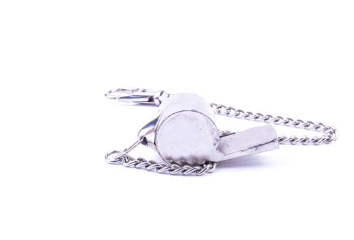 the beautiful world cup whistle with stainless steal ornamental chain
on the white background