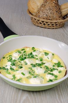 Omelet with goat cheese (Adygei cheese) and green onions