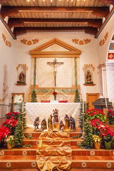 Mission San Luis Obispo de Tolosa, Basilica, Altar, Cross San Luis Obispo California.  Founded 1772 by  Father Junipero Serra.  Named for Saint Louis of Anjou