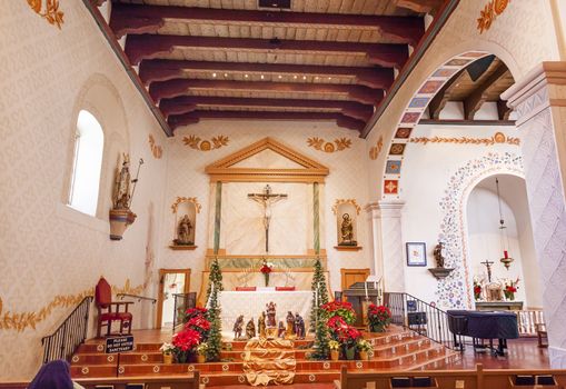 Mission San Luis Obispo de Tolosa, Basilica, Altar, Cross San Luis Obispo California.  Founded 1772 by  Father Junipero Serra.  Named for Saint Louis of Anjou