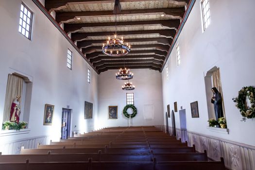 Mission San Luis Obispo de Tolosa, Basilica, Wooden Pews San Luis Obispo California.  Founded 1772 by  Father Junipero Serra.  Named for Saint Louis of Anjou