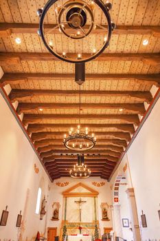 Mission San Luis Obispo de Tolosa, Wooden Ceiling, Basilica, Altar, Cross San Luis Obispo California.  Founded 1772 by  Father Junipero Serra.  Named for Saint Louis of Anjou