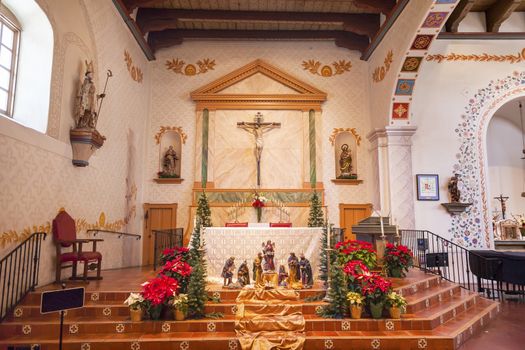 Mission San Luis Obispo de Tolosa, Basilica, Altar, Cross San Luis Obispo California.  Founded 1772 by  Father Junipero Serra.  Named for Saint Louis of Anjou