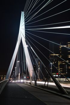 ROTTERDAM, NETHERLANDS - MAY 29, 2014: Erasmus Bridge (Dutch: Erasmusbrug) in the city centre of Rotterdam at night on May 29, 2014 in Rotterdam, South Holland, the Netherlands.