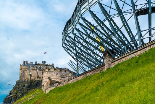 Edinburgh Castle on Castle Rock in Edinburgh, Scotland, UK getting ready for the military tattoo with tribunes being mounted along the entrance walls