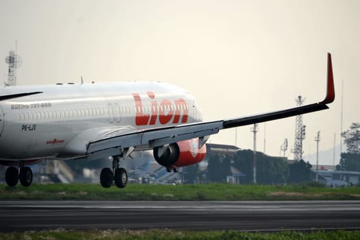 bandung, indonesia-june 16, 2014: Lion Air airplane taking manoeuvre on husein sastranegara airport bandung.