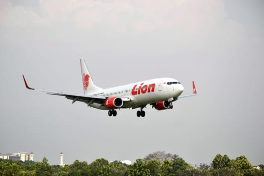 bandung, indonesia-june 16, 2014: Lion Air airplane taking manoeuvre on husein sastranegara airport bandung.