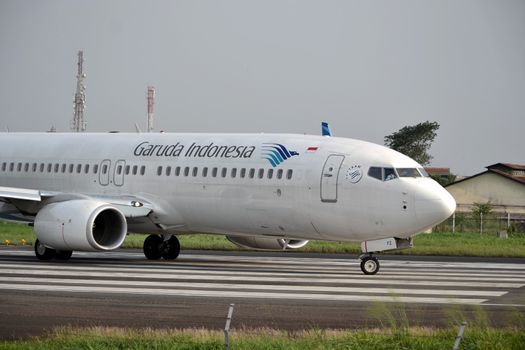 bandung, indonesia-june 16, 2014: Garuda Indonesia airline taking manoeuvre on husein sastranegara airport bandung.
