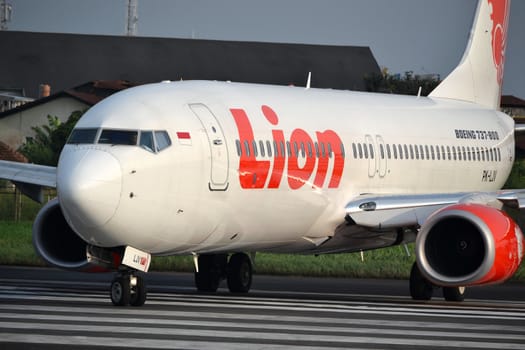 bandung, indonesia-june 16, 2014: Lion Air airplane taking manoeuvre on husein sastranegara airport bandung.