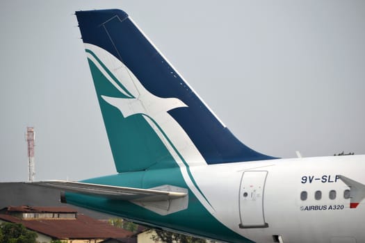 bandung, indonesia-june 16, 2014: Silk Air airplane taking manoeuvre on husein sastranegara airport bandung.