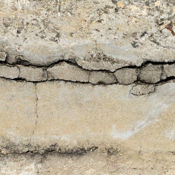 Composition of cracked concrete texture closeup background. 