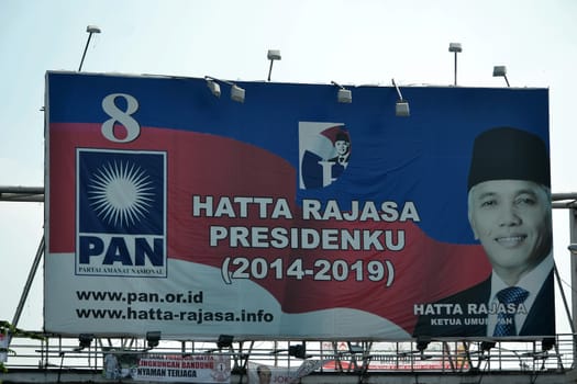 bandung, indonesia-june 16, 2014: hatta rajasa political billboard shown for indonesian election 2014