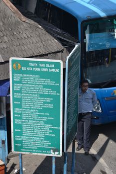 bandung, indonesia-june 16, 2014: bus parking at cicaheum bus station waiting for passenger to board.