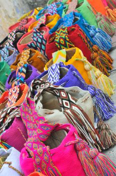 Multi-colored colombian bags on a market stall in Cartagena, Colombia