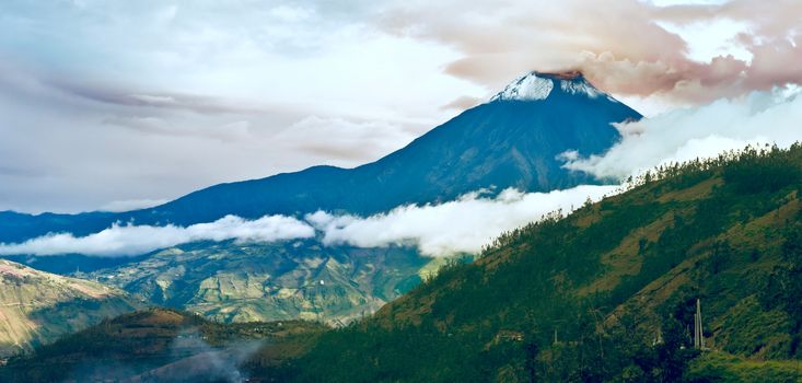 Hermosa Valley with Eruption of a volcano Tungurahua and town Banios de Agua Santa in Ecuador