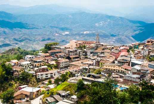 Zaruma - Town in the Andes, Ecuador. Located in the southern province of El Oro (meaning literally "the gold") in the western range of the Andes mountains, Zaruma is a lovely hilltop town with steep twisted streets, painted wooden buildings, and fabulous views of the surrounding landscape