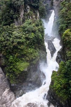 Pailon del Diablo - Mountain river and waterfall in the Andes. Banos. Ecuador