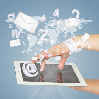 Hand holding a tablet pc. Letters and envelopes are emitted from the screen of tablet. Concept electronic mailing
