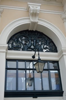 ornate window with black frame