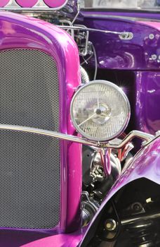 purple hot-rod with exposed engine