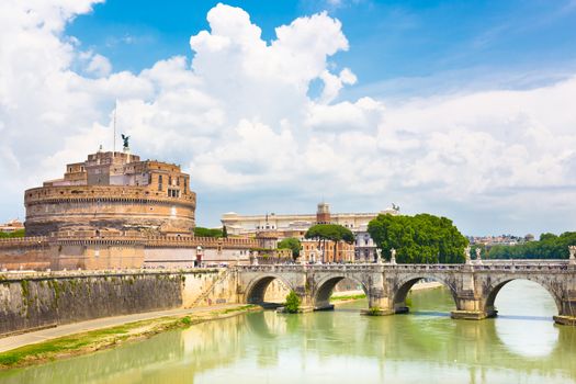 Tiber river and Sant Angelo Castle and Bridge in Rome, Italia.
