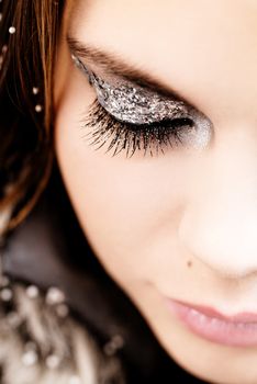 Beautiful silvery and glittery party makeup
