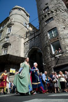 GENOA, ITALY - 8 JUNE 2014 - Unidentified people during the historical parade of the Maritime Republics Palio