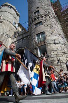 GENOA, ITALY - 8 JUNE 2014 - Unidentified people during the historical parade of the Maritime Republics Palio