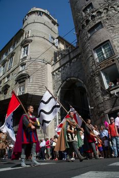 GENOA, ITALY - 8 JUNE 2014 - Unidentified people during the historical parade of the Maritime Republics Palio