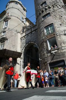 GENOA, ITALY - 8 JUNE 2014 - Unidentified people during the historical parade of the Maritime Republics Palio