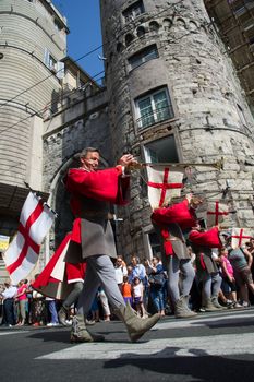 GENOA, ITALY - 8 JUNE 2014 - Unidentified people during the historical parade of the Maritime Republics Palio