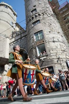 GENOA, ITALY - 8 JUNE 2014 - Unidentified people during the historical parade of the Maritime Republics Palio