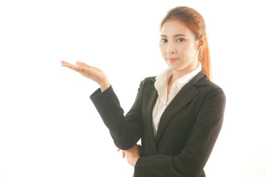 Business asian woman presenting a copyspace isolated on white background
