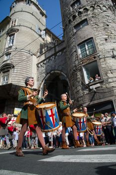 GENOA, ITALY - 8 JUNE 2014 - Unidentified people during the historical parade of the Maritime Republics Palio