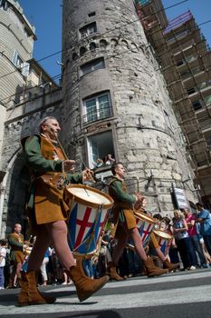 GENOA, ITALY - 8 JUNE 2014 - Unidentified people during the historical parade of the Maritime Republics Palio
