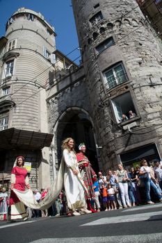 GENOA, ITALY - 8 JUNE 2014 - Unidentified people during the historical parade of the Maritime Republics Palio